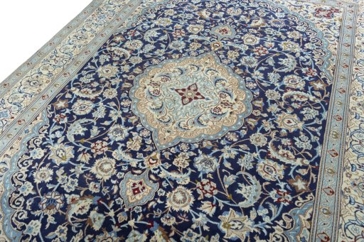 Backside of handmade 2000s Nain rug showing knot structure and weave density