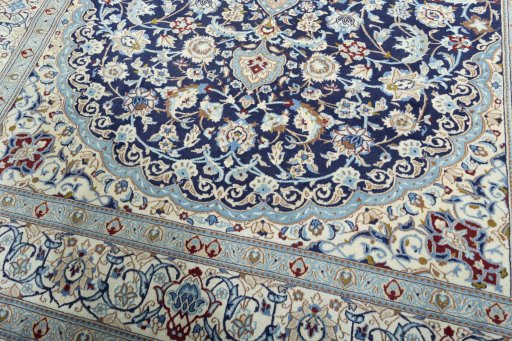 Close-up detail of 2000s Nain rug from Iran / Persia showing Wool weave