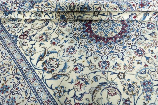 Close-up detail of 2000s Nain rug from Iran / Persia showing Wool weave