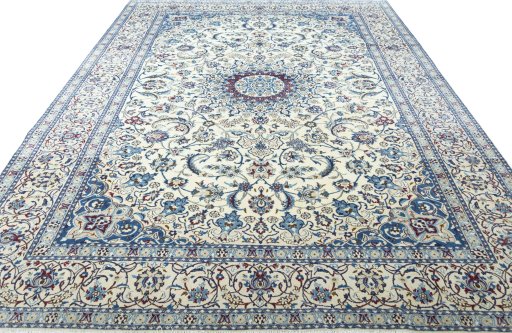 Surface texture of 2000s Nain rug with natural Wool and intricate pattern