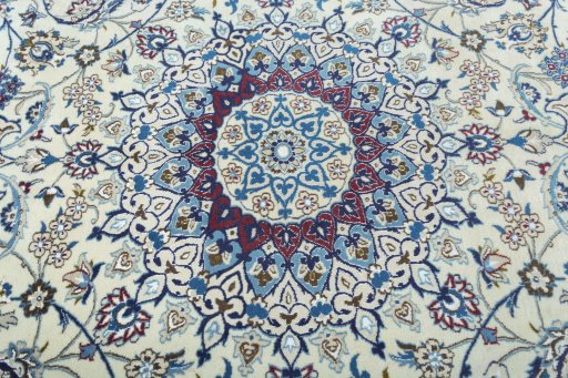 Central medallion detail of 2000s Nain rug from Iran / Persia