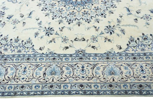 Corner detail of New Nain rug showing border pattern and Wool pile