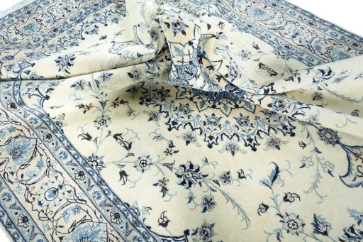 Surface texture of New Nain rug with natural Wool and intricate pattern