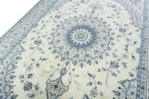 Backside of handmade New Nain rug showing knot structure and weave density