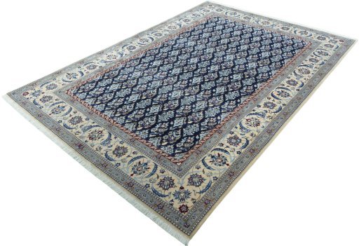 Corner detail of New Nain rug showing border pattern and Wool pile