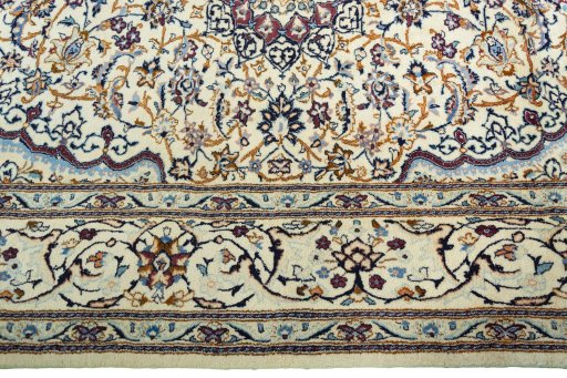 Corner detail of 2000s Nain rug showing border pattern and Wool pile