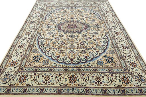 Surface texture of 2000s Nain rug with natural Wool and intricate pattern