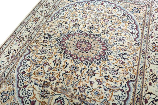 Backside of handmade 2000s Nain rug showing knot structure and weave density