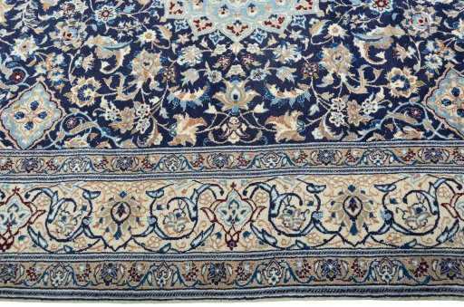 Corner detail of 2000s Nain rug showing border pattern and Wool pile