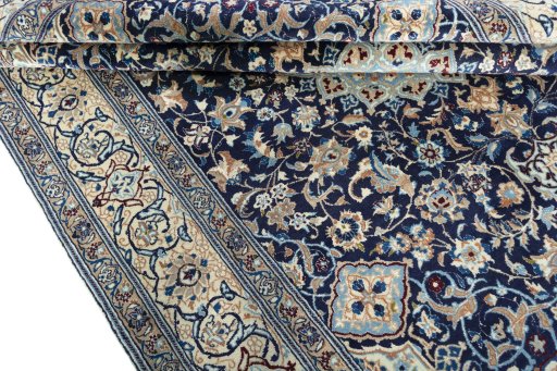 Close-up detail of 2000s Nain rug from Iran / Persia showing Wool weave
