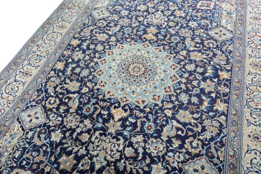 Backside of handmade 2000s Nain rug showing knot structure and weave density
