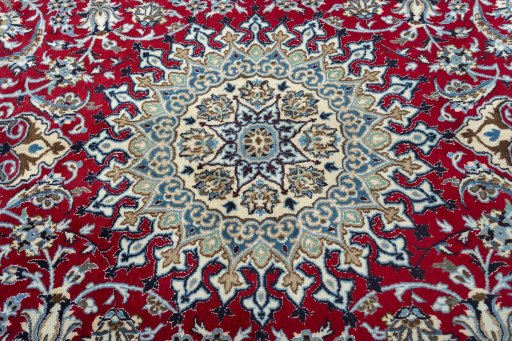 Central medallion detail of New Nain rug from Iran / Persia
