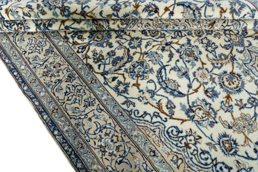 Close-up detail of 2000s Nain rug from Iran / Persia showing Wool weave