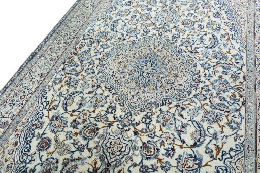 Backside of handmade 2000s Nain rug showing knot structure and weave density