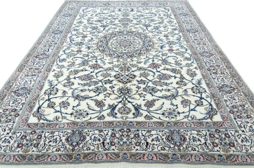 Surface texture of 2000s Nain rug with natural Wool and intricate pattern