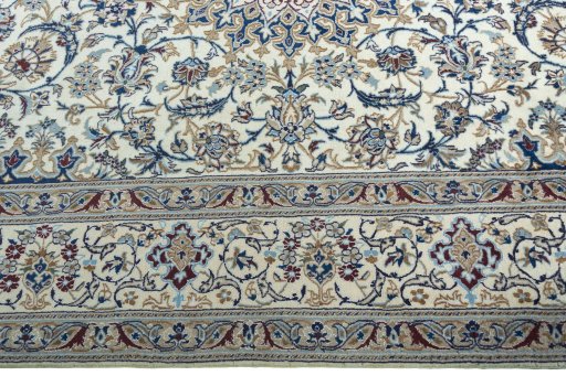 Corner detail of 2000s Nain rug showing border pattern and Wool pile