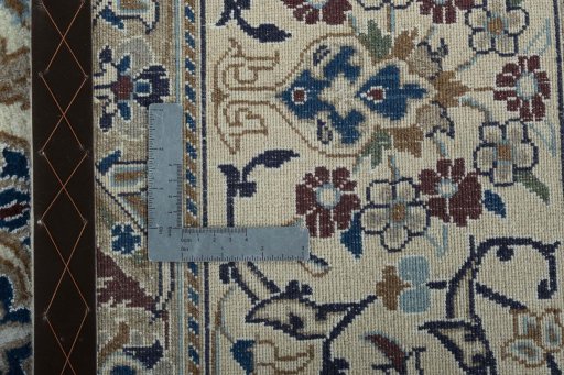 Backside of handmade 2000s Nain rug showing knot structure and weave density