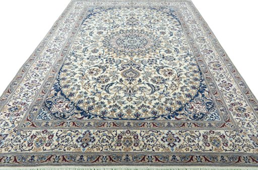 Surface texture of 2000s Nain rug with natural Wool and intricate pattern