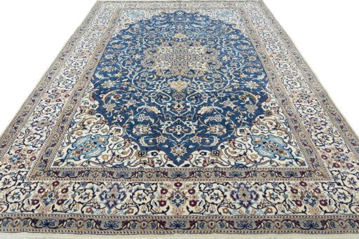 Surface texture of 2000s Nain rug with natural Wool and intricate pattern