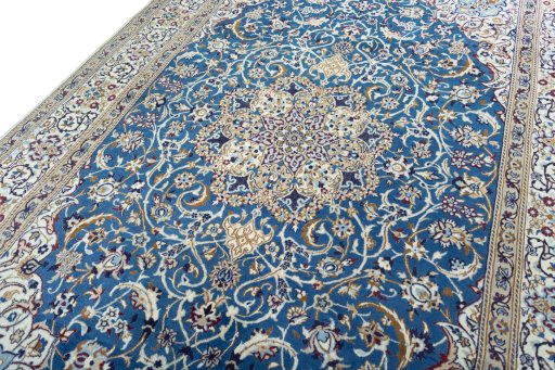 Backside of handmade 2000s Nain rug showing knot structure and weave density