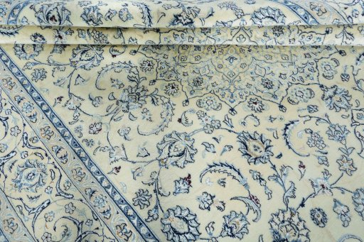 Close-up detail of New Nain rug from Iran / Persia showing Wool weave