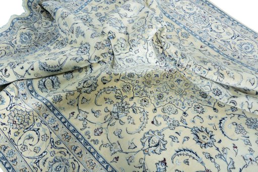 Surface texture of New Nain rug with natural Wool and intricate pattern
