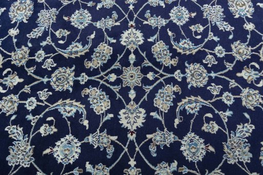 Central medallion detail of 2000s Nain rug from Iran / Persia