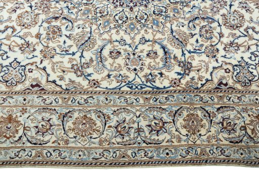 Corner detail of 2000s Nain rug showing border pattern and Wool pile