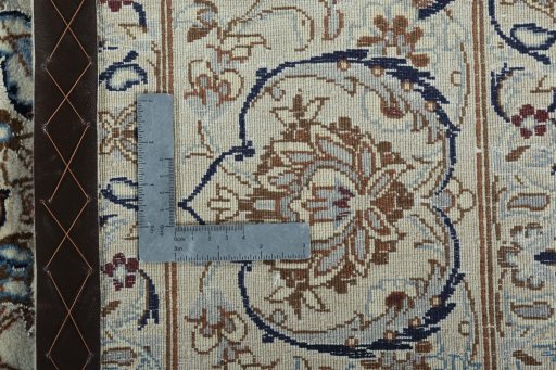 Backside of handmade 2000s Nain rug showing knot structure and weave density