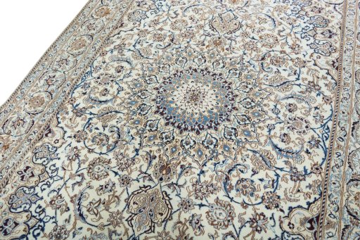 Backside of handmade 2000s Nain rug showing knot structure and weave density