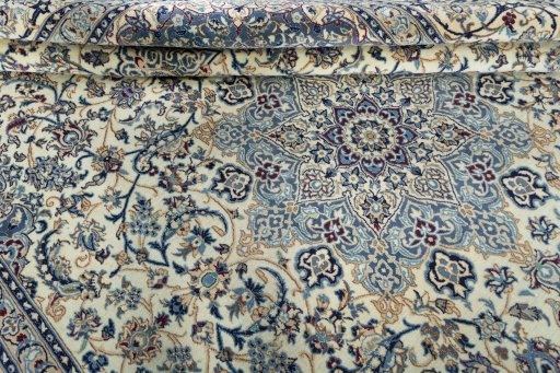 Close-up detail of 2000s Nain rug from Iran / Persia showing Wool weave