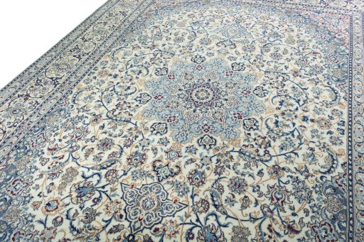 Backside of handmade 2000s Nain rug showing knot structure and weave density