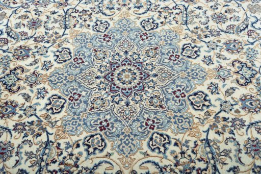 Central medallion detail of 2000s Nain rug from Iran / Persia