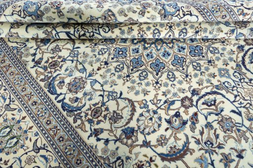 Close-up detail of 2000s Nain rug from Iran / Persia showing Wool weave