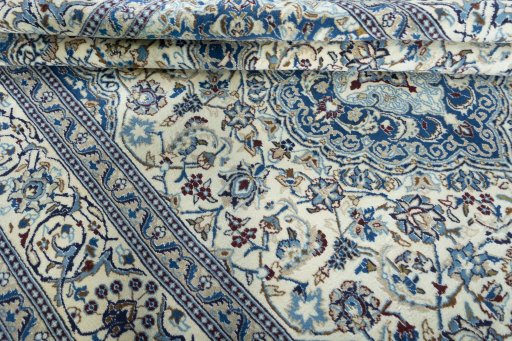 Close-up detail of 2000s Nain rug from Iran / Persia showing Wool weave
