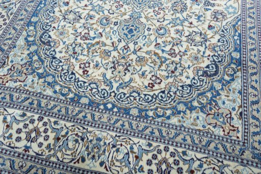 Close-up detail of 2000s Nain rug from Iran / Persia showing Wool weave