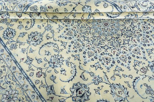Close-up detail of New Nain rug from Iran / Persia showing Wool weave