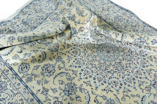 Surface texture of New Nain rug with natural Wool and intricate pattern