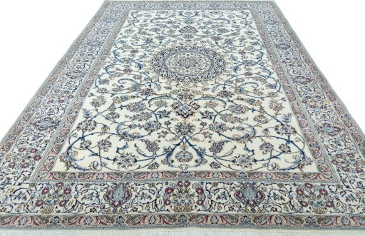 Surface texture of 2000s Nain rug with natural Wool and intricate pattern