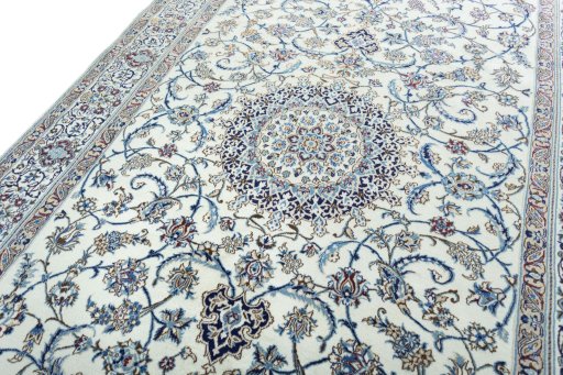 Backside of handmade 2000s Nain rug showing knot structure and weave density