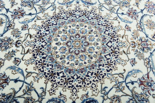 Central medallion detail of 2000s Nain rug from Iran / Persia