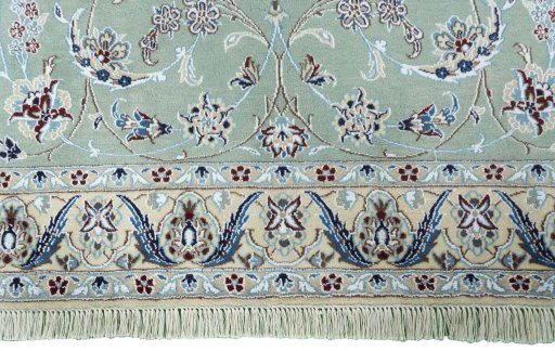 Close-up detail of New Nain rug from Iran / Persia showing Wool weave