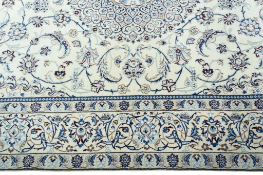Corner detail of 2000s Nain rug showing border pattern and Wool pile