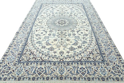Surface texture of 2000s Nain rug with natural Wool and intricate pattern