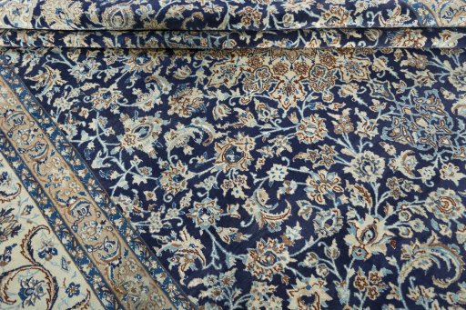 Close-up detail of 2000s Nain rug from Iran / Persia showing Wool weave