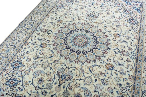 Backside of handmade 2000s Nain rug showing knot structure and weave density