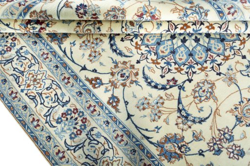 Close-up detail of 2000s Nain rug from Iran / Persia showing Wool weave