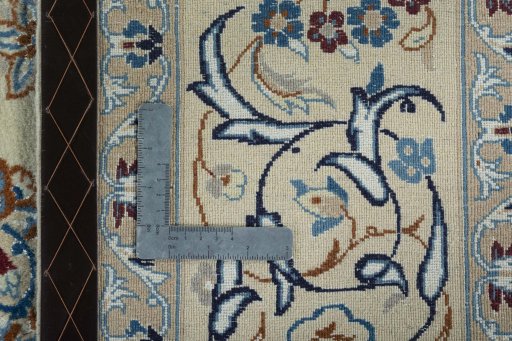Backside of handmade 2000s Nain rug showing knot structure and weave density