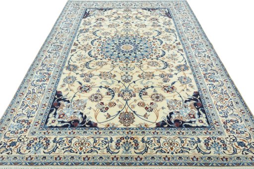 Surface texture of 2000s Nain rug with natural Wool and intricate pattern