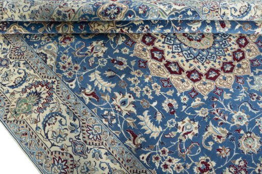 Close-up detail of 2000s Nain rug from Iran / Persia showing Wool weave